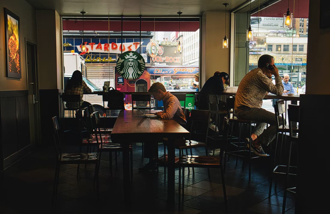 Digital nomad working in cafe